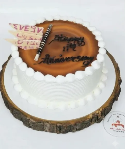 Anniversary cake with caramel top and chocolate writing