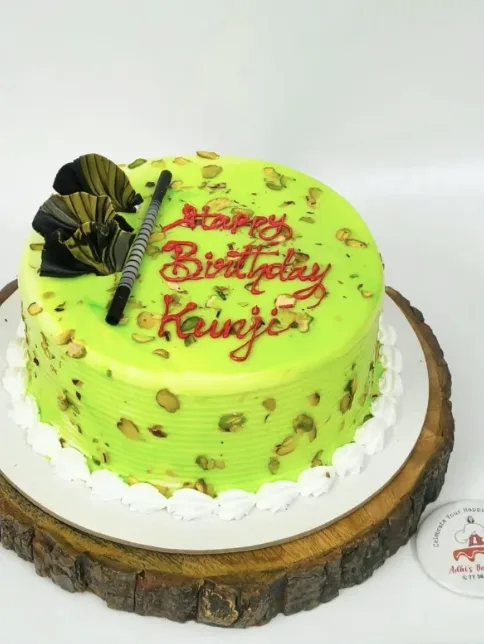 Pistachio cake with chocolate fan decoration